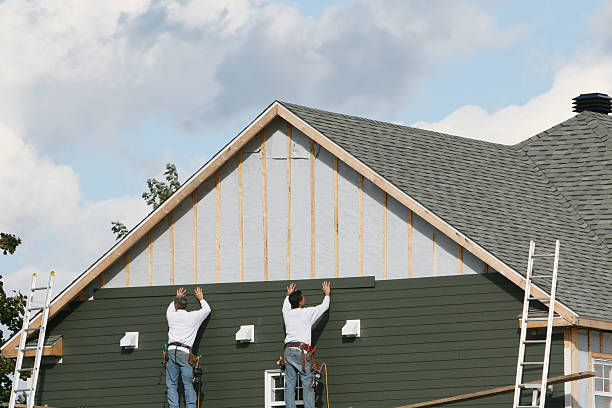 Professional Emergency Siding Repair technician working in Newton, MA